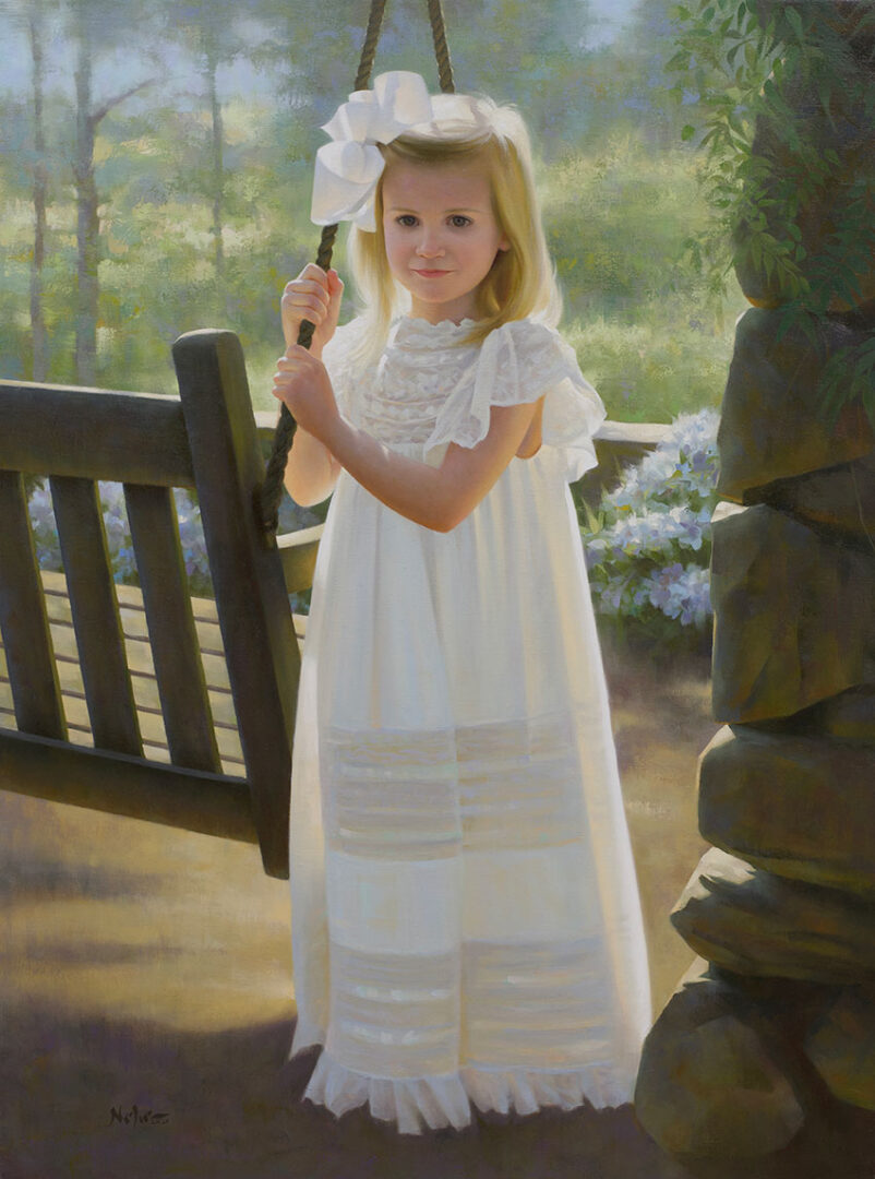 A portrait of a young girl in a white dress
