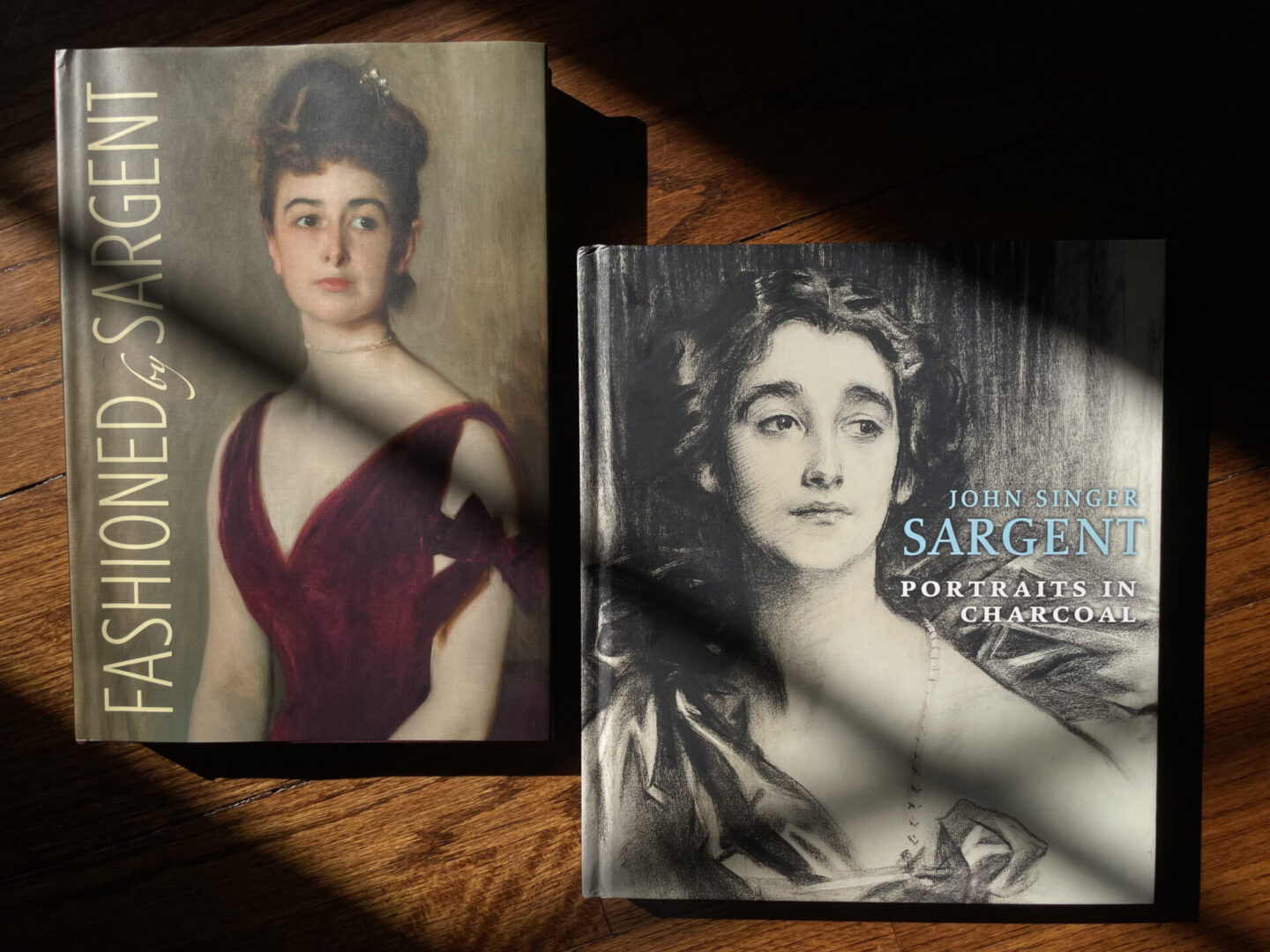 Two books on women 's fashion and beauty.